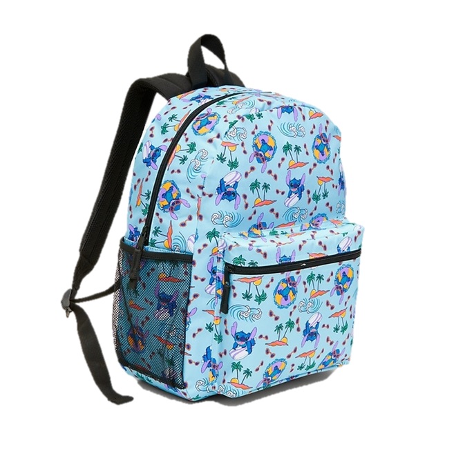 A light blue backpack featuring a colorful, cartoony pattern with surfing scenes and tropical elements. It has a front zipper pocket and side mesh pocket.