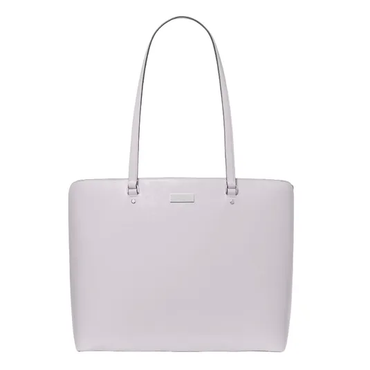 A light lavender tote bag with a minimalist design, featuring long straps and a small rectangular metal accent below the top edge.