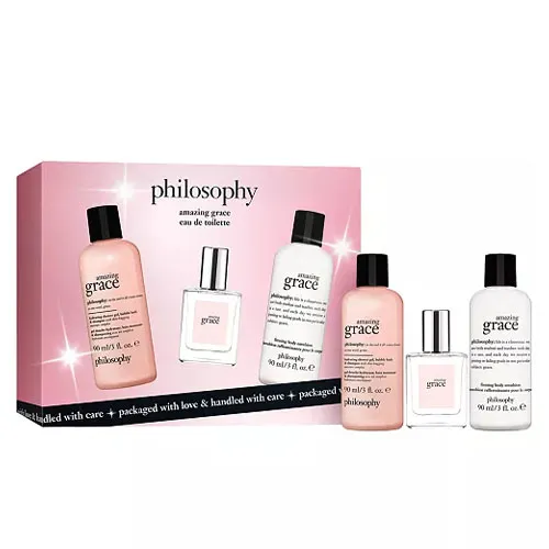 Philosophy Amazing Grace eau de toilette gift set includes a shampoo, shower gel, body lotion, and fragrance spray in pink and white packaging.