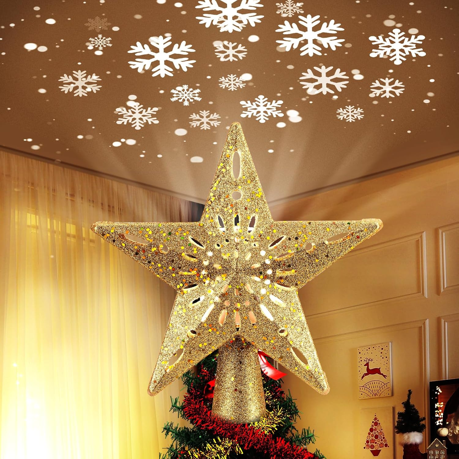 Glittery gold star tree topper projecting white snowflakes onto the ceiling, enhancing holiday decor.