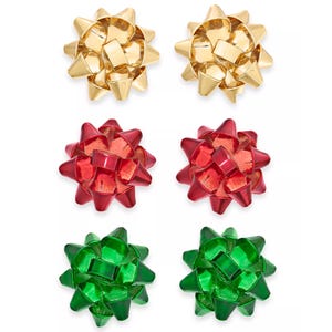 Gift bow earrings in gold, red, and green, styled to resemble traditional gift wrap bows, arranged in pairs.