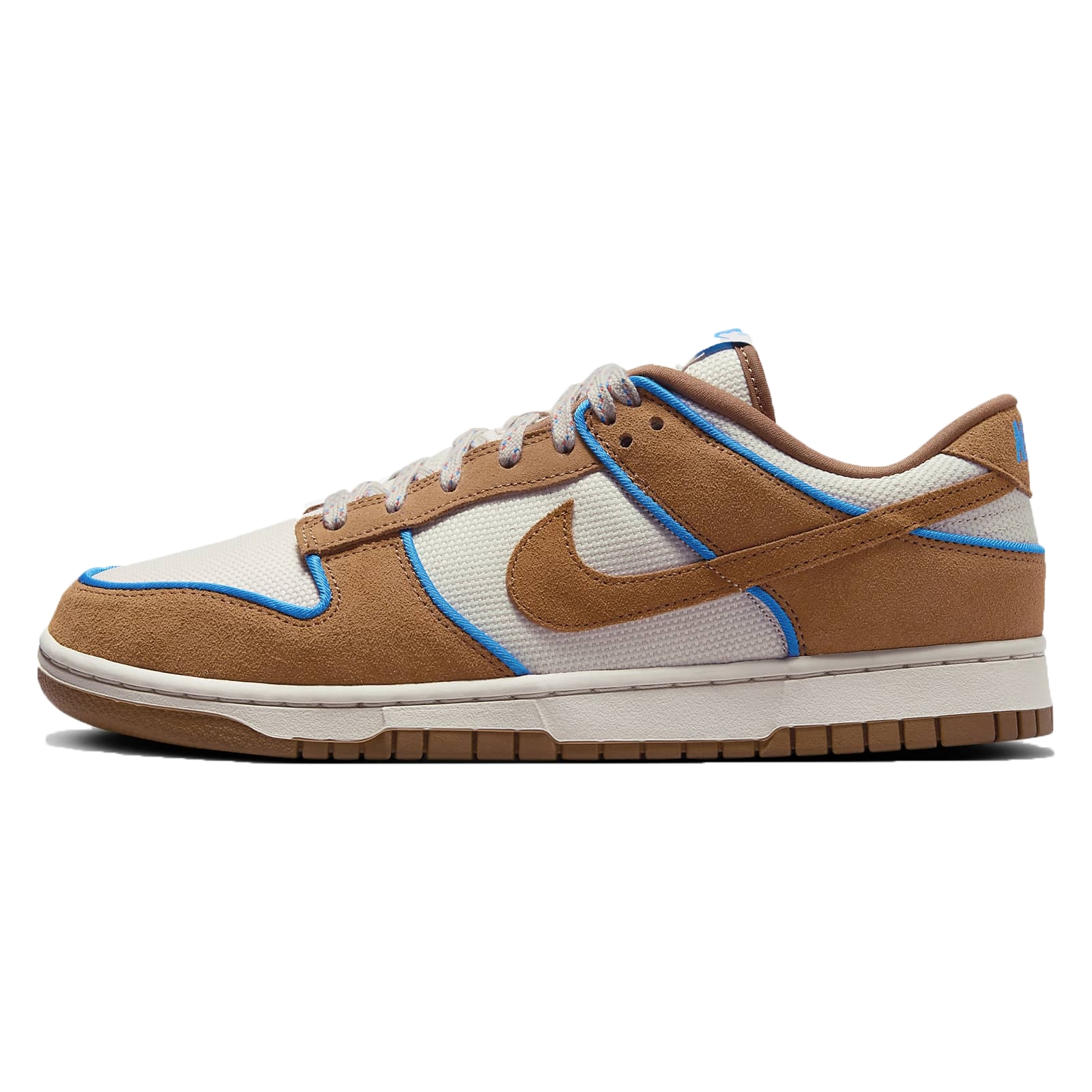 Nike Dunk Low sneakers with a beige and brown color scheme, accented by blue piping.
