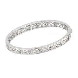Silver bangle bracelet with an intricate openwork design featuring small floral or star-like patterns around the band.