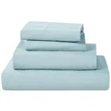 A neatly folded set of light blue bed sheets, including a fitted sheet, flat sheet, and two pillowcases.