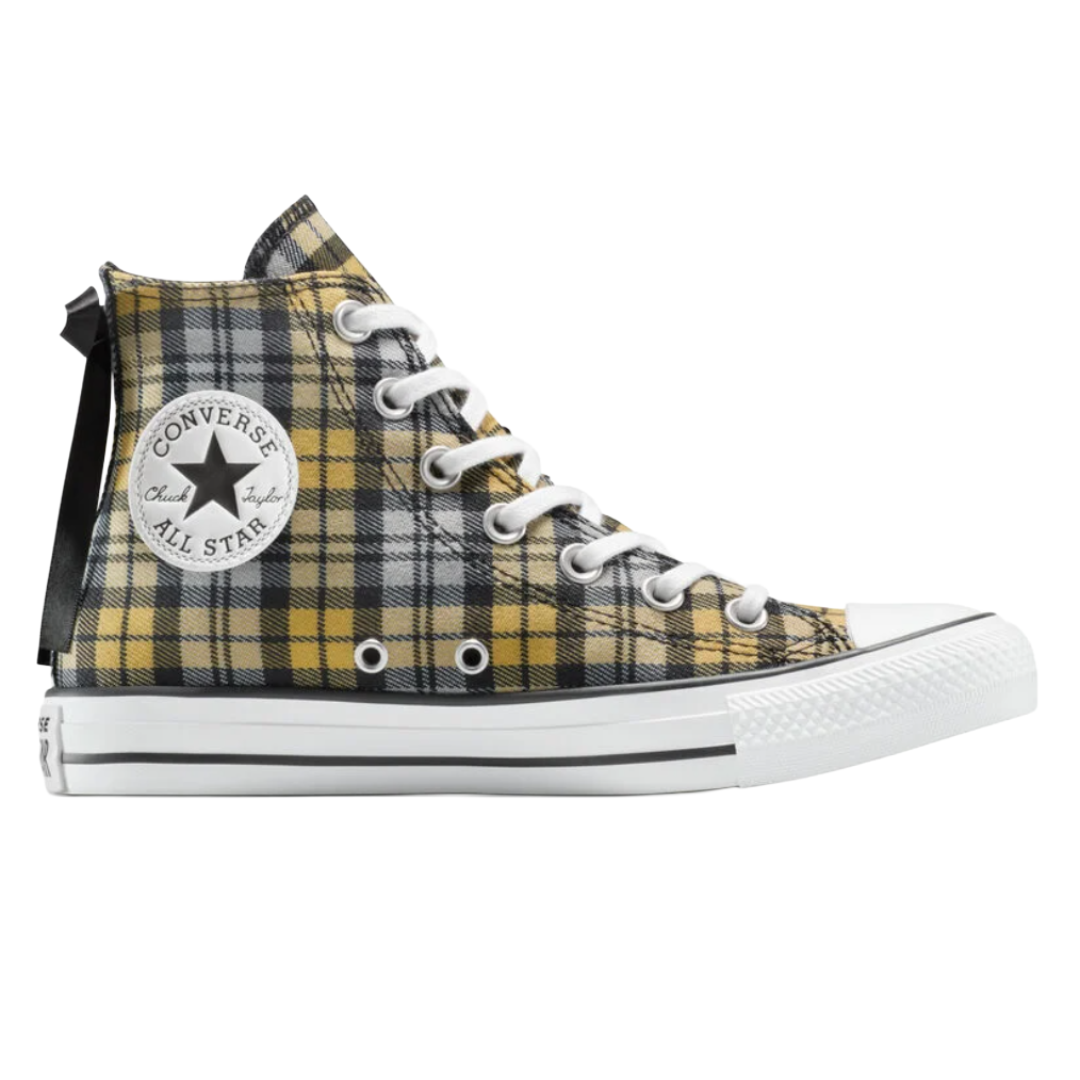 High-top Converse All Star sneaker with a yellow and black plaid pattern, featuring white laces and a white rubber sole with black accents.