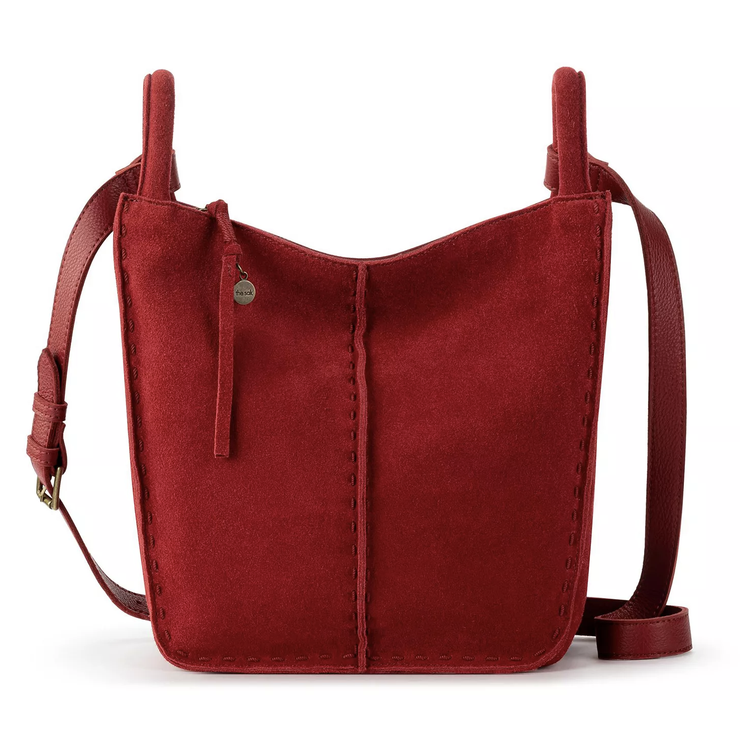 A red suede shoulder bag with a simple design, featuring vertical stitching and an adjustable strap.