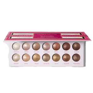 Laura Geller The Delectables Baked Eyeshadow palette with 14 shades, including neutrals and warm tones like gold, bronze, and brown.
