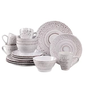 This is a 16-piece stoneware dinnerware set featuring a textured pattern, including four dinner plates, four salad plates, four bowls, and four mugs, all in a coordinated beige color.