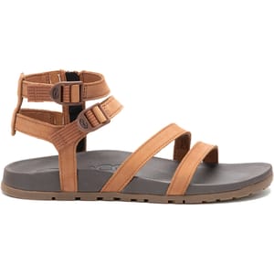 Brown strappy sandal with adjustable ankle and toe straps, featuring a flat sole for comfort.