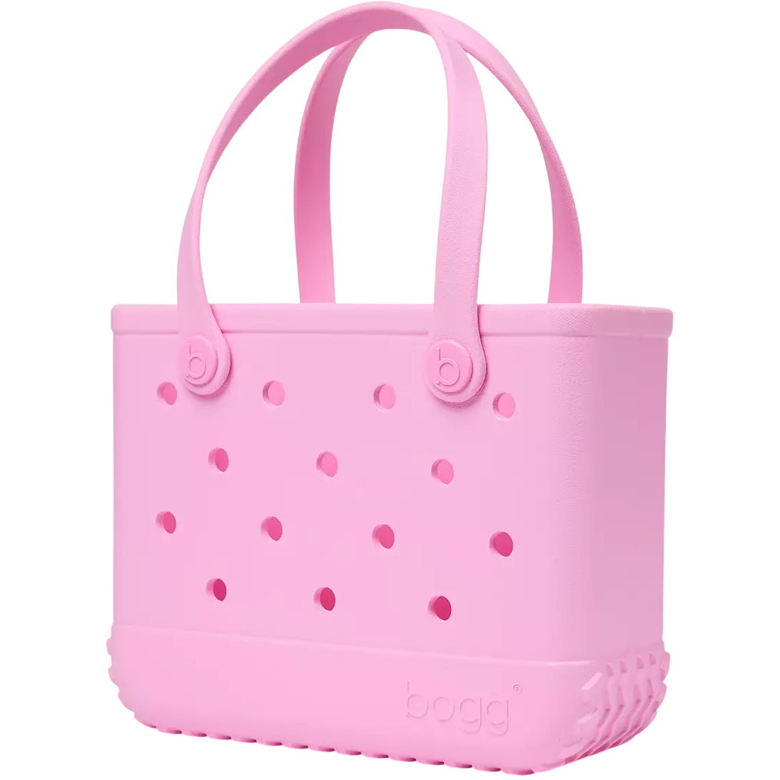 A pink tote bag with a perforated design and sturdy handles, featuring the brand \“Bogg\“ embossed on the lower front.
