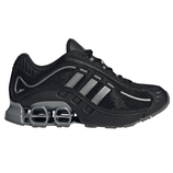 A black athletic shoe with gray accents, featuring distinctive sole cushioning and four diagonal stripes on the side.