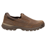 A brown Caterpillar slip-on work shoe with a rugged sole and elastic side panels for easy wear.