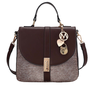A brown and tweed handbag with a top handle and a detachable strap, featuring gold-tone hardware and decorative charms.