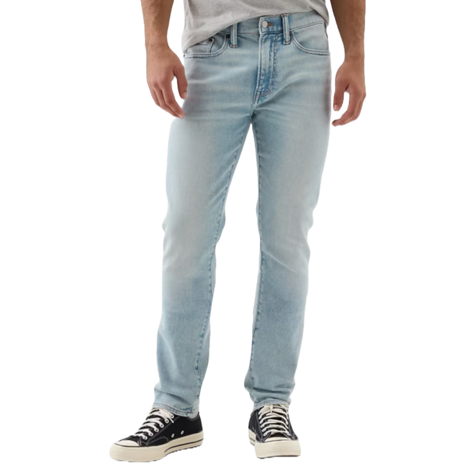 Light blue, slim-fit men's jeans with a standard five-pocket design, paired with black and white high-top sneakers.