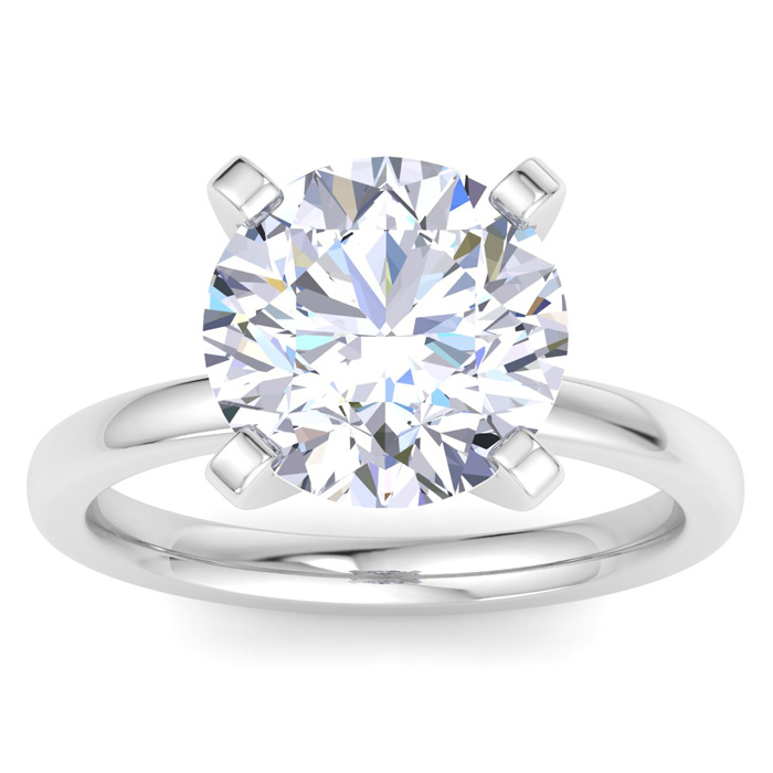 A round brilliant 5-carat lab-grown diamond ring set in a four-prong platinum band, featuring a highly reflective and clear gemstone with a classic solitaire design.
