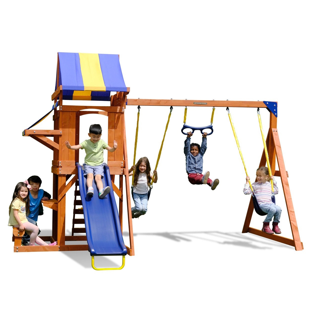 Children playing on a wooden playset with a blue slide, swings, and a climbing structure covered by a blue and yellow canopy.