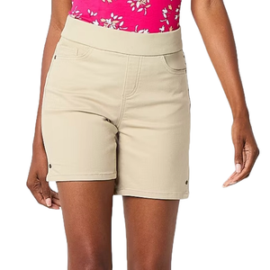 Liz Claiborne Mid-Rise Pull-On Shorts are beige, knee-length with an elastic waistband and side pockets, paired with a bright pink floral top.