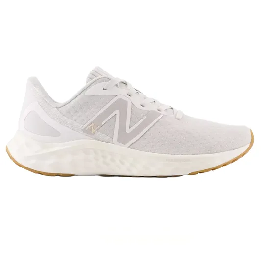 A white New Balance sneaker with a breathable mesh upper, featuring a beige \“N\“ logo, cushioned white sole, and beige gum outsole.
