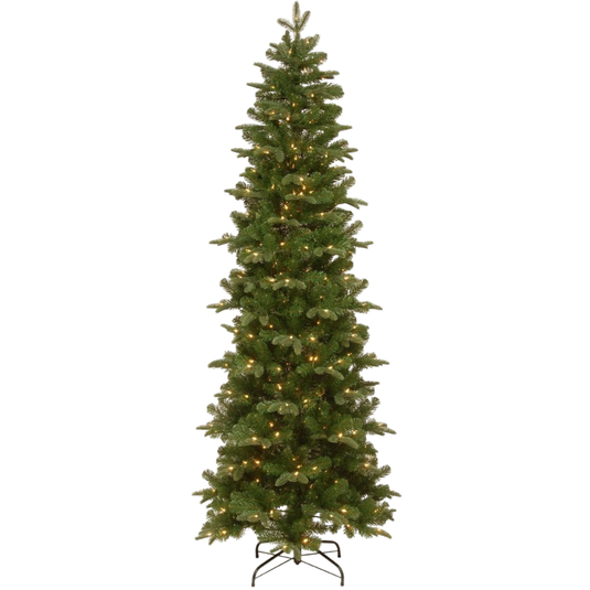 A tall, slender artificial Christmas tree with realistic green branches, pre-lit with warm white lights, and supported by a metal stand.