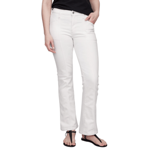 White bootcut jeans paired with a black top and black sandals, featuring front stitching and a button closure.