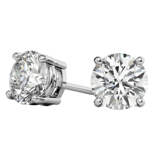 A pair of round diamond stud earrings set in a prong setting with a metal backing, likely made of silver or white gold.
