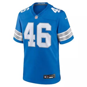 Detroit Lions NFL jersey with number 46, in blue with silver stripes on the sleeves. Features \“ONE PRIDE\“ on the collar and Nike logo on the shoulder.