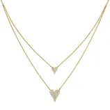 A gold-tone necklace featuring two heart-shaped pendants adorned with small, sparkling stones on a double-layer chain design.