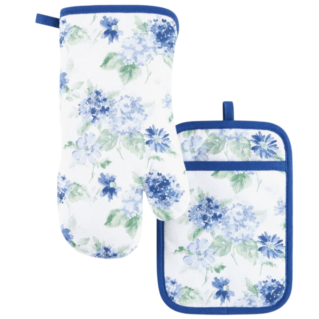 Floral oven mitt and pot holder set featuring blue and green flowers on a white background with blue trim.