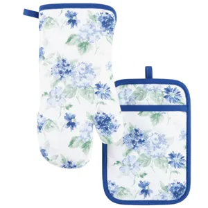 Floral oven mitt and pot holder set featuring blue and green flowers on a white background with blue trim.