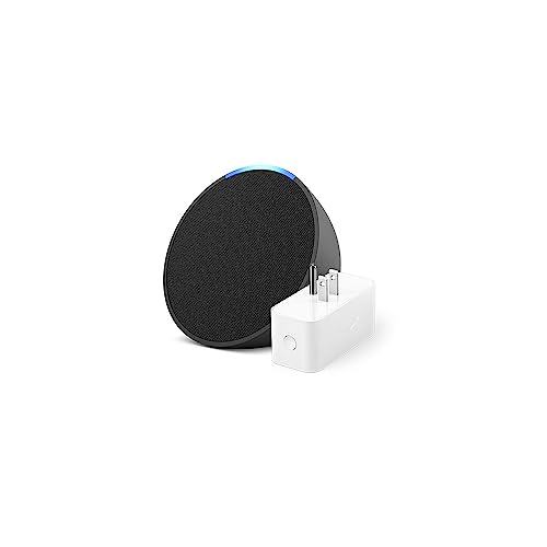 A round, black Echo Dot speaker with blue LED light trim is shown beside a white rectangular Amazon Smart Plug.