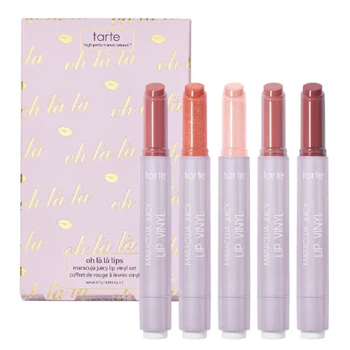 Tarte Oh Là Là Lips Maracuja Juicy Lip Vinyl Set features five lip vinyl colors, packaged in a pastel purple box with gold accents.