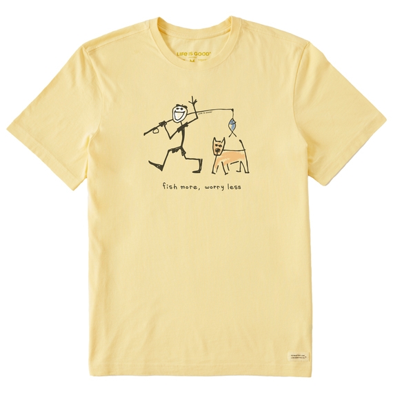 Yellow T-shirt with a simple drawing of a stick figure fishing alongside a dog and the phrase \“fish more, worry less.\“