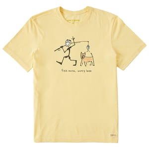 Yellow T-shirt with a simple drawing of a stick figure fishing alongside a dog and the phrase \“fish more, worry less.\“