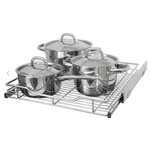 Three stainless steel pots with lids are on a metal pull-out wire rack.