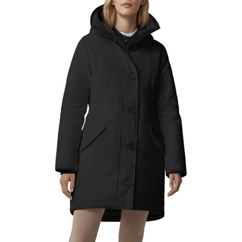 A black Canada Goose Rossclair Parka is shown, featuring a fitted mid-thigh length, button-front closure, insulated hood, and two front pockets, designed for cold weather protection.