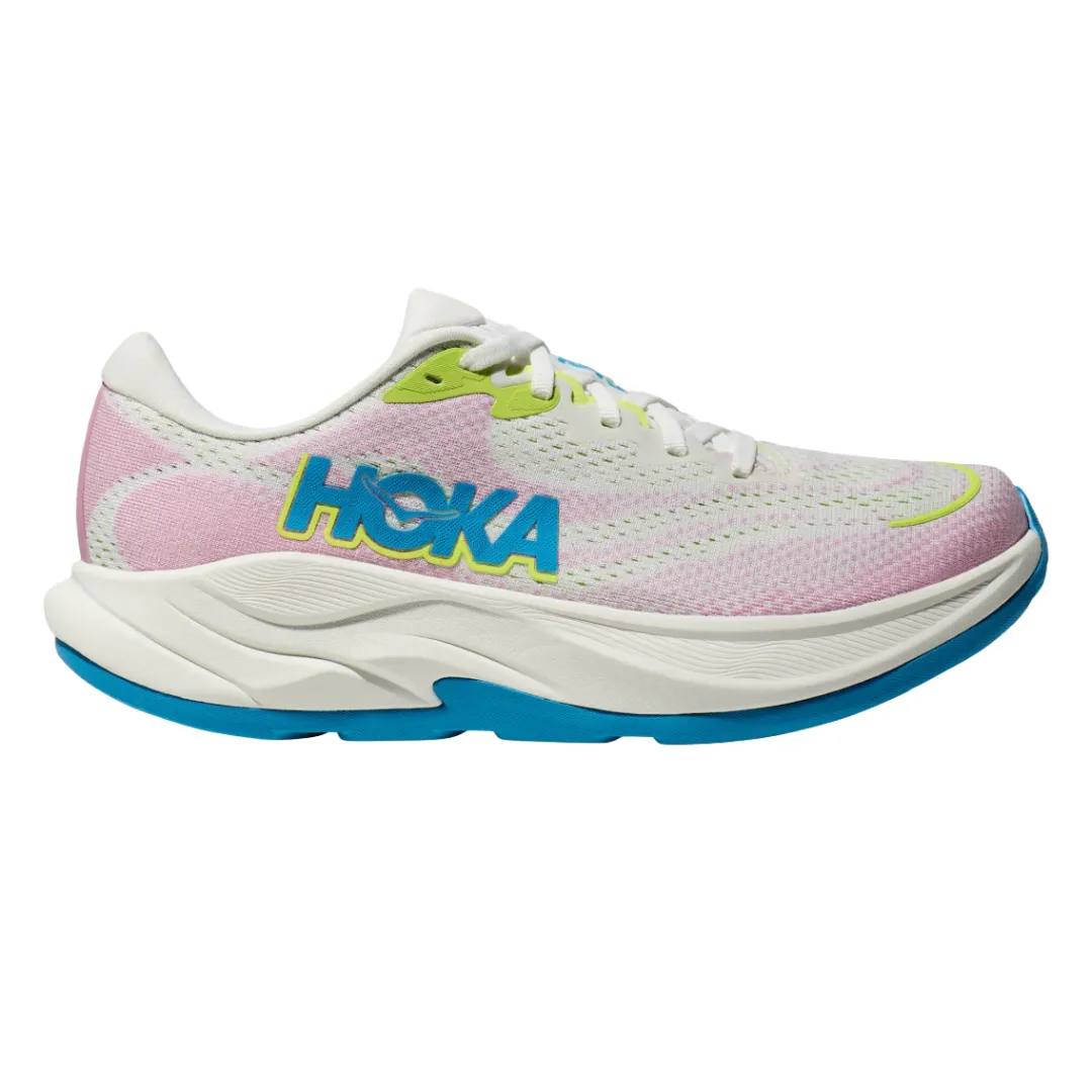 Hoka running shoe featuring a pink and white upper, with blue and green accents, a cushioned white midsole, and a bright blue outsole.