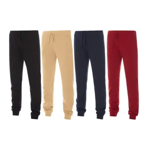 Four pairs of sweatpants in black, beige, navy, and red, each featuring an adjustable drawstring waist and elastic cuffs.