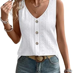 Sleeveless white crochet top with button details, paired with denim shorts.