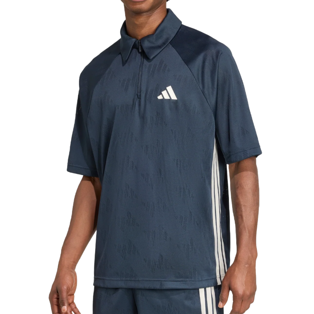 A dark blue Adidas short-sleeve polo shirt with a partial zip collar, featuring a small logo on the chest and white side stripes.