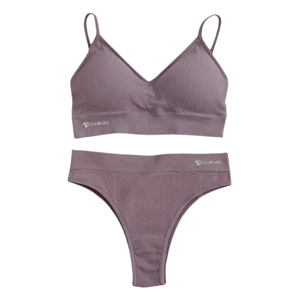 A mauve ribbed bralette and matching high-waisted thong set with brand logo detailing on both pieces.