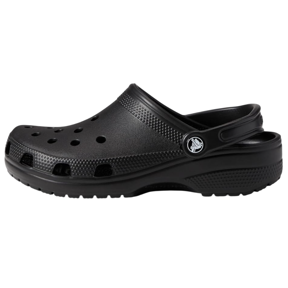 A black clog-style shoe with perforations for ventilation and an adjustable heel strap, featuring a small circular logo detail.