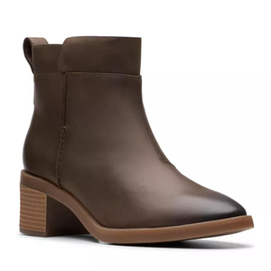 Brown ankle boot with a stacked block heel and smooth leather finish, featuring a pull tab at the back.