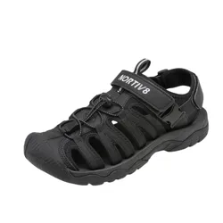 A black outdoor hiking sandal with a closed toe, adjustable strap, secure toggle lacing system, and a durable sole.