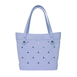 A light purple Crocs tote bag featuring a quilted pattern with perforations and two sturdy handles.