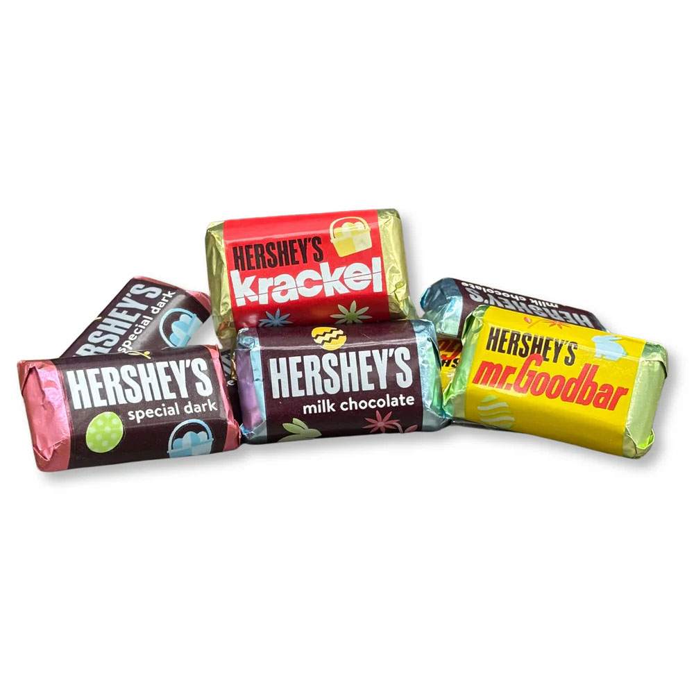 A selection of Hershey's mini chocolates, including Special Dark, Milk Chocolate, Krackel, and Mr. Goodbar. Each is wrapped in colorful packaging with Easter-themed decorations.