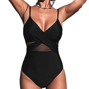 A black one-piece swimsuit with a V-neck and mesh detailing, featuring crisscross straps at the front and thin shoulder straps.