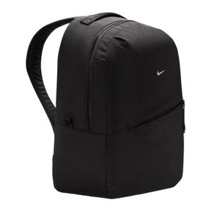 A black Nike backpack with a small white swoosh logo, featuring a large main compartment and a front zippered pocket.