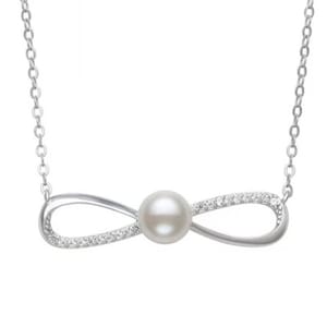 Silver infinity symbol necklace with a pearl center, adorned with small crystals on part of the loops.