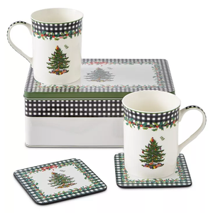 5pc Spode Christmas Mug Set includes two mugs, a metal storage tin, and two coasters. Each item features a festive Christmas tree design with a black checkered border and holly accents.