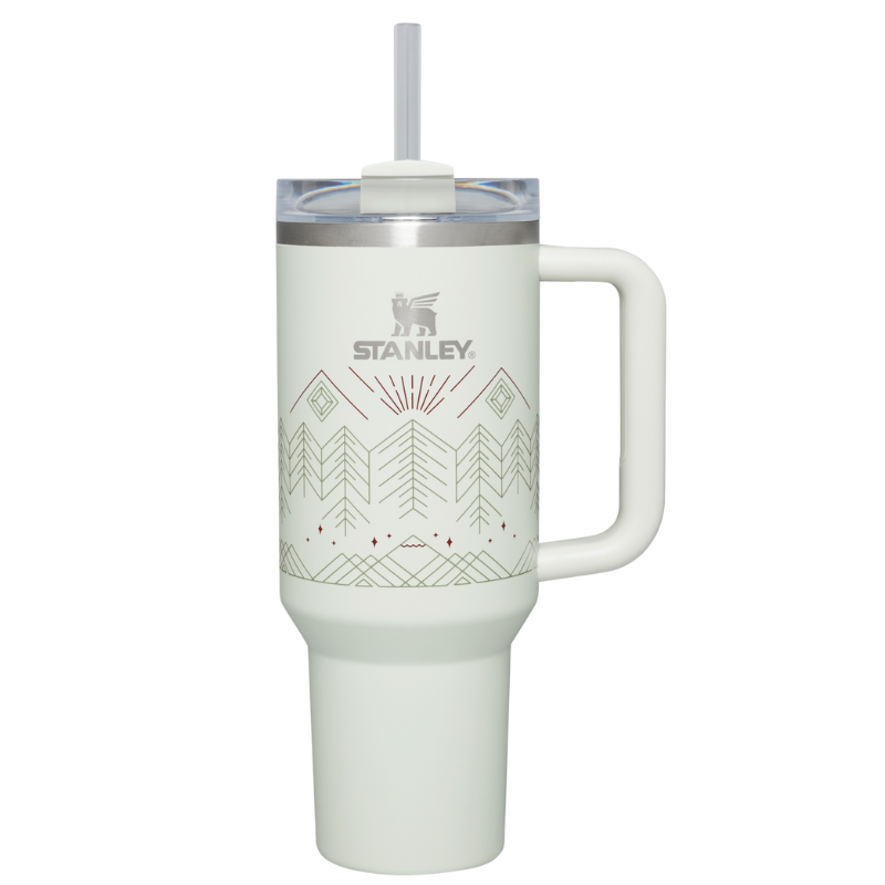 Stanley insulated travel mug with a handle, lid, straw, and geometric design.